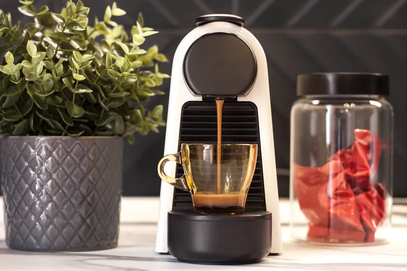 Kitchen · espresso machine and coffee cups