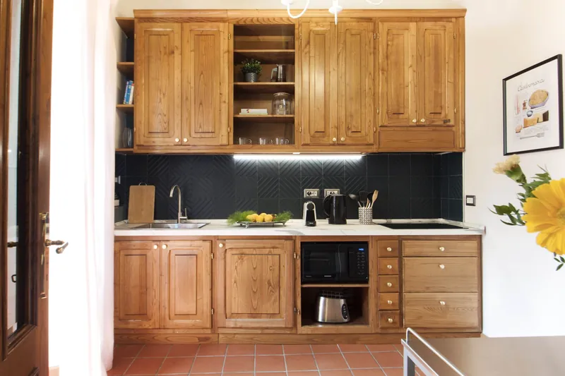 Kitchen · cooking area and wooden cabinets