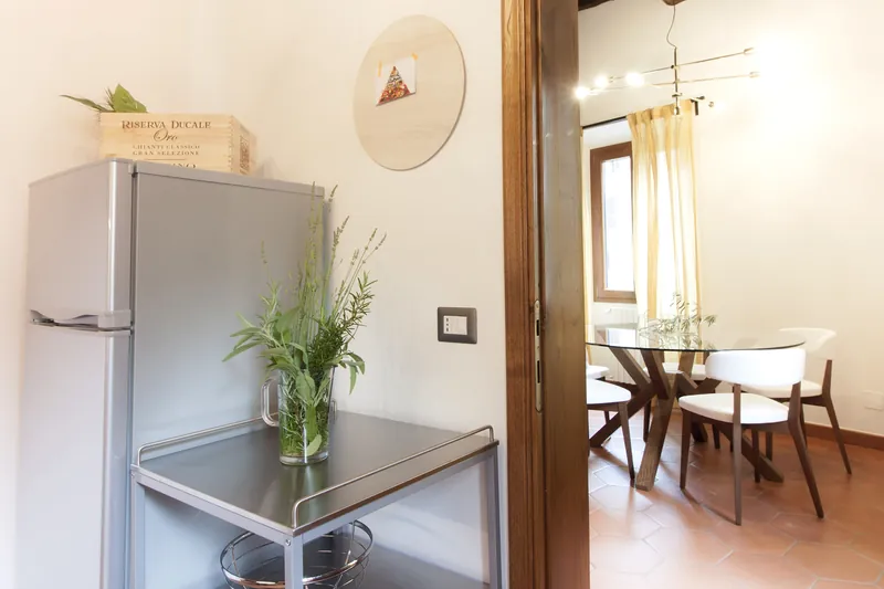 Kitchen · refrigerator and doorway to the dining room