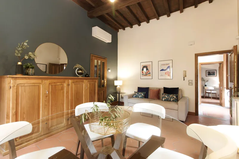Living and dining room · table, sofa and exposed beams