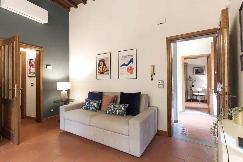 Living room · sofa and doorway to the kitchen
