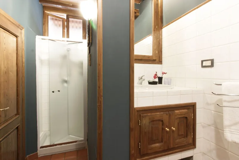 Private bathroom with shower for the floral bedroom